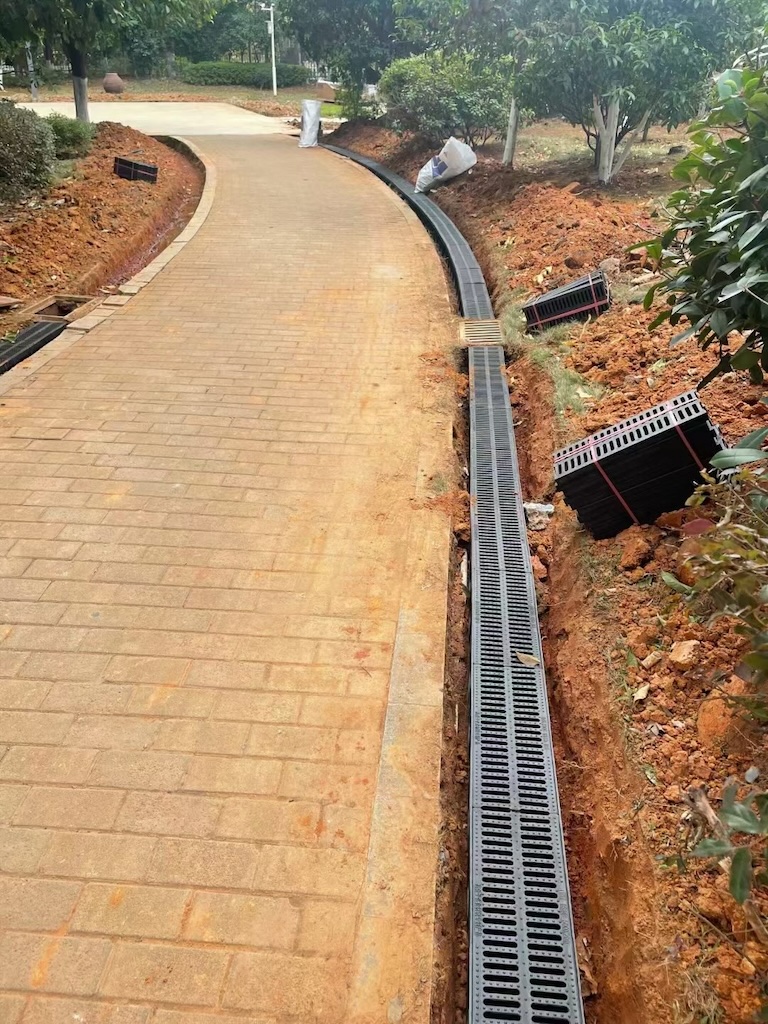 Linear drainage system installation for plastic drainage solutions on an infrastructure project